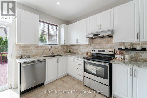 1016 Mccuaig Drive, Milton, ON - Indoor Photo Showing Kitchen With Double Sink With Upgraded Kitchen