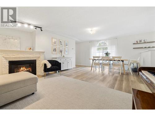 3585 Elk Road Unit# 8, West Kelowna, BC - Indoor Photo Showing Living Room With Fireplace