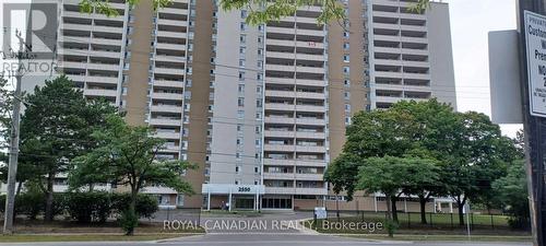 307 - 2550 Pharmacy Avenue, Toronto, ON - Outdoor With Balcony With Facade