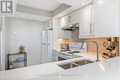 514 - 300 Webb Drive, Mississauga, ON - Indoor Photo Showing Kitchen With Double Sink