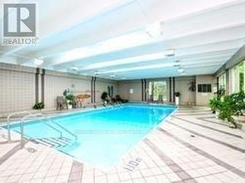 908 - 3700 Kaneff Crescent, Mississauga, ON - Outdoor With In Ground Pool
