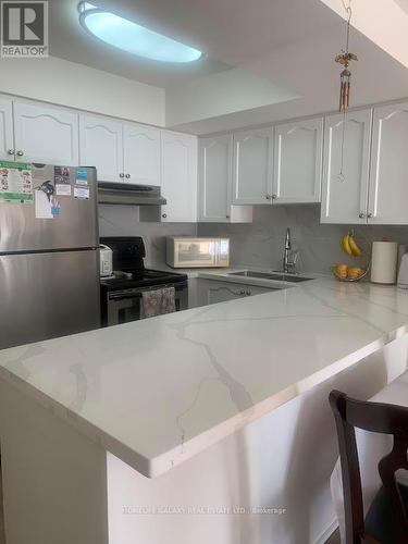 2153 - 105 George Appleton Way, Toronto, ON - Indoor Photo Showing Kitchen With Double Sink