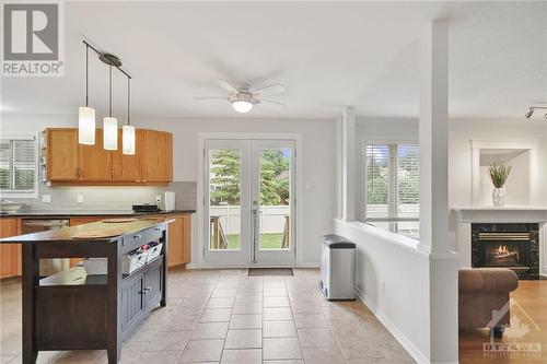 764 Rolling River Crescent, Ottawa, ON - Indoor Photo Showing Kitchen With Fireplace