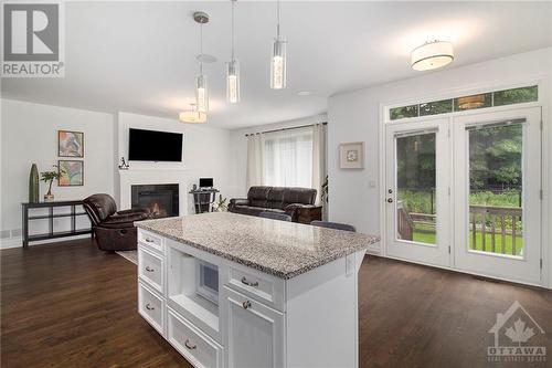 179 Avro Circle, Ottawa, ON - Indoor Photo Showing Kitchen With Fireplace