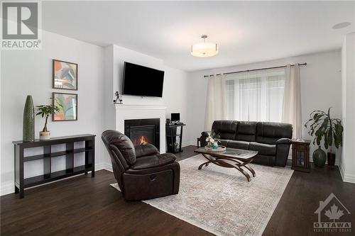 179 Avro Circle, Ottawa, ON - Indoor Photo Showing Living Room With Fireplace