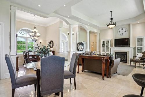 9893 Dickenson Road W, Hamilton, ON - Indoor Photo Showing Dining Room With Fireplace