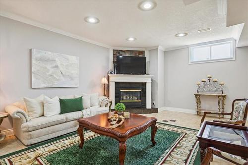 9893 Dickenson Road W, Hamilton, ON - Indoor Photo Showing Living Room With Fireplace