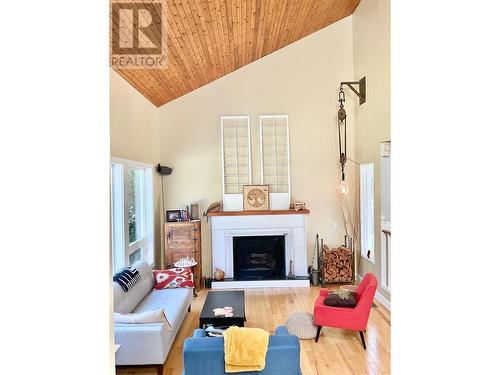 1920 3 Highway, Midway, BC - Indoor Photo Showing Living Room With Fireplace