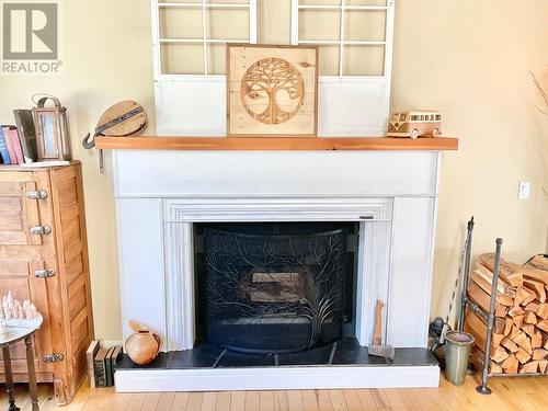 1920 3 Highway, Midway, BC - Indoor Photo Showing Living Room With Fireplace