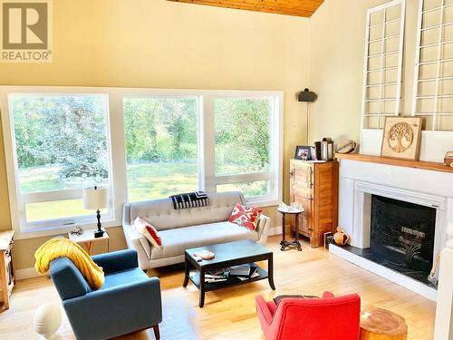 1920 3 Highway, Midway, BC - Indoor Photo Showing Living Room With Fireplace