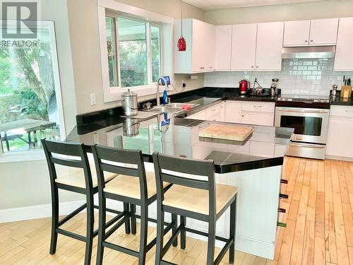 1920 3 Highway, Midway, BC - Indoor Photo Showing Kitchen With Double Sink