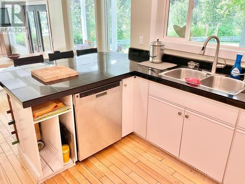 1920 3 Highway, Midway, BC - Indoor Photo Showing Kitchen With Double Sink