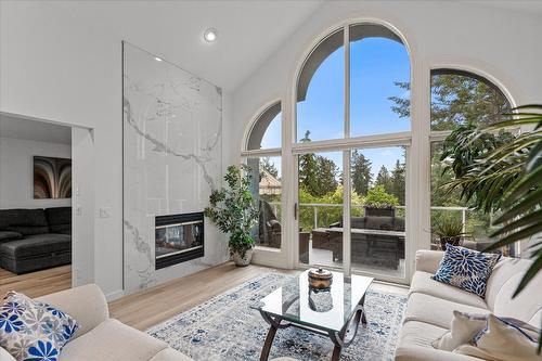 4187 Gallaghers Crescent, Kelowna, BC - Indoor Photo Showing Living Room With Fireplace