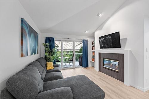 4187 Gallaghers Crescent, Kelowna, BC - Indoor Photo Showing Living Room With Fireplace