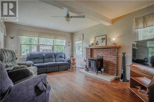 6130 3Rd Line Road, Bainsville, ON - Indoor Photo Showing Living Room With Fireplace