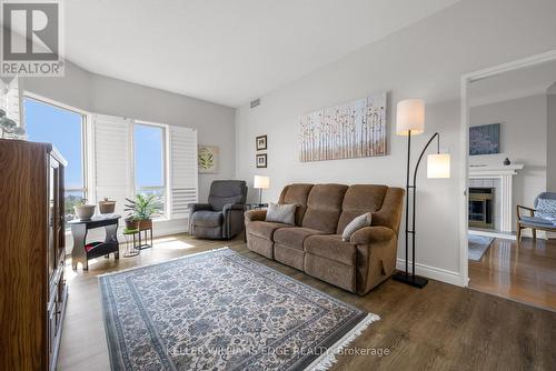 1108 - 1201 North Shore Boulevard E, Burlington, ON - Indoor Photo Showing Living Room With Fireplace