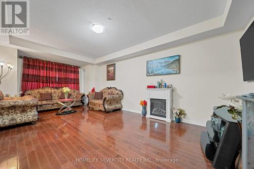13 Bonsai Lane, Brampton, ON - Indoor Photo Showing Living Room With Fireplace