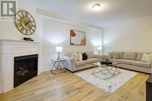 33 Junior Road, Brampton, ON - Indoor Photo Showing Living Room With Fireplace