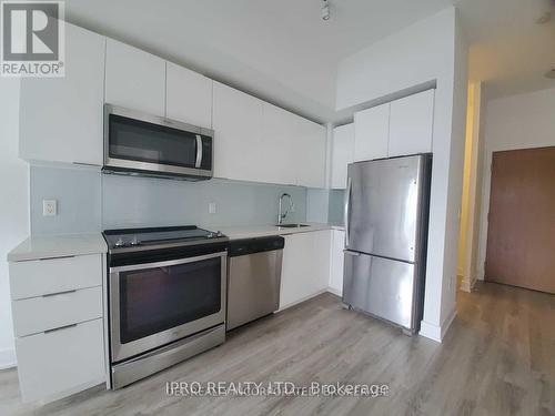 403 - 20 Shore Breeze Drive, Toronto (Mimico), ON - Indoor Photo Showing Kitchen With Stainless Steel Kitchen