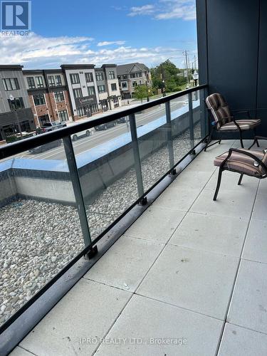 207 - 385 Winston Road N, Grimsby, ON - Outdoor With Balcony