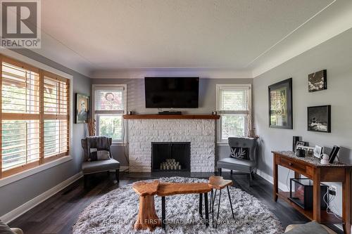 14 Dengate Crescent, London, ON - Indoor Photo Showing Living Room With Fireplace