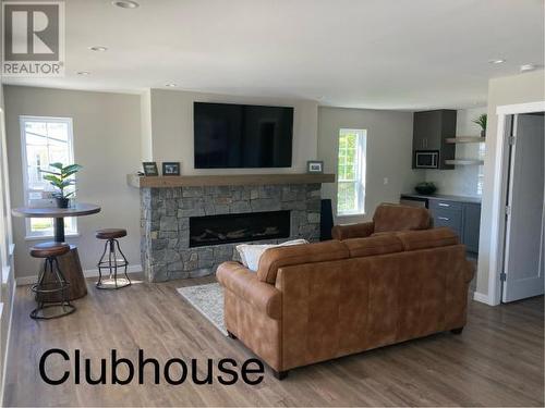 106-7440 Nootka Street, Powell River, BC - Indoor Photo Showing Living Room With Fireplace