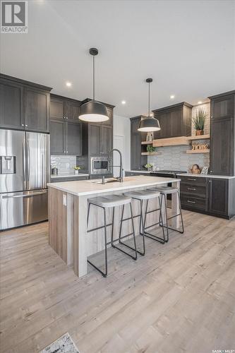 331 Dziadyk Bend, Saskatoon, SK - Indoor Photo Showing Kitchen With Upgraded Kitchen