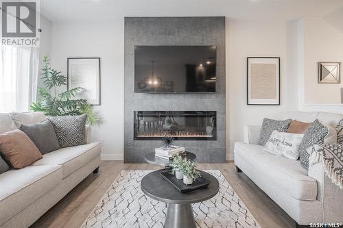 331 Dziadyk Bend, Saskatoon, SK - Indoor Photo Showing Living Room With Fireplace