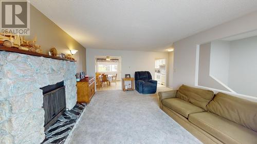 8812 87 Street, Fort St. John, BC - Indoor Photo Showing Living Room With Fireplace
