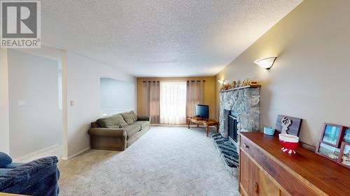8812 87 Street, Fort St. John, BC - Indoor With Fireplace