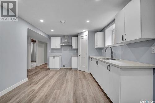 1412 20Th Street W, Saskatoon, SK - Indoor Photo Showing Kitchen With Double Sink