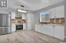 1412 20Th Street W, Saskatoon, SK  - Indoor Photo Showing Kitchen With Stainless Steel Kitchen With Upgraded Kitchen 