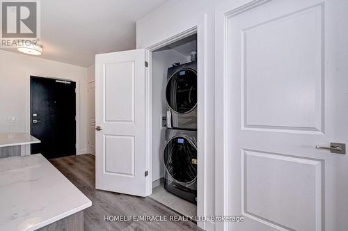 910 - 15 Glebe Street N, Cambridge, ON - Indoor Photo Showing Laundry Room