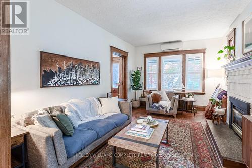 19 Ashford Boulevard, Hamilton, ON - Indoor Photo Showing Living Room With Fireplace