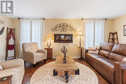 84 New York Avenue, Wasaga Beach, ON - Indoor Photo Showing Living Room With Fireplace