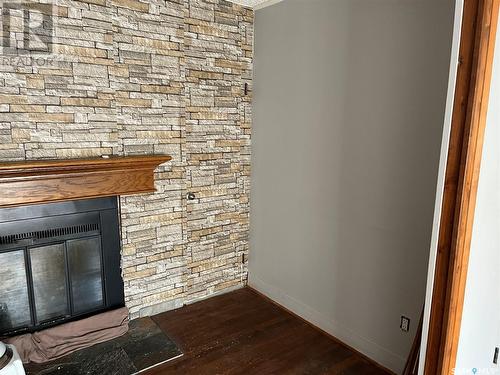 1520 F Avenue N, Saskatoon, SK - Indoor Photo Showing Other Room With Fireplace