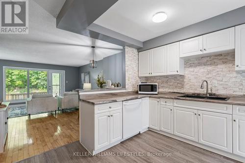 56 - 642 Wonderland Road S, London, ON - Indoor Photo Showing Kitchen With Double Sink