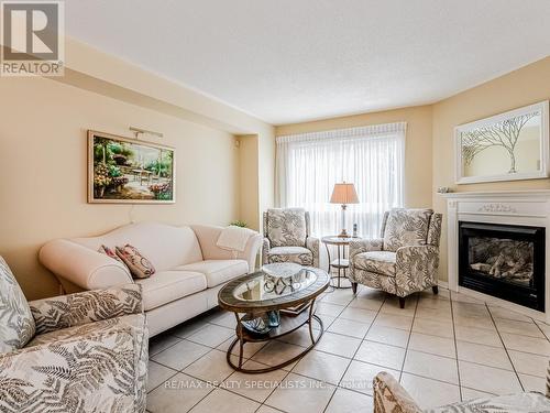 1626 Casablanca Circle, Mississauga, ON - Indoor Photo Showing Living Room With Fireplace