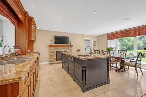 1059 Scenic Drive, Hamilton, ON - Indoor Photo Showing Kitchen With Fireplace With Double Sink