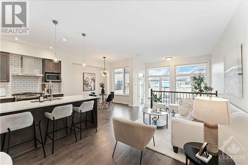 breakfast bar kitchen - 653 Tennant Way, Ottawa, ON - Indoor