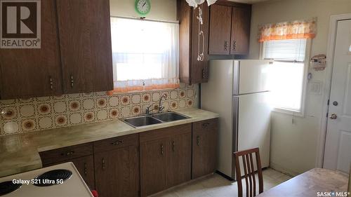 969 Elphinstone Street, Regina, SK - Indoor Photo Showing Kitchen With Double Sink