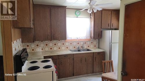 969 Elphinstone Street, Regina, SK - Indoor Photo Showing Kitchen With Double Sink