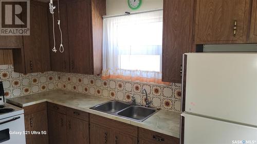 969 Elphinstone Street, Regina, SK - Indoor Photo Showing Kitchen With Double Sink