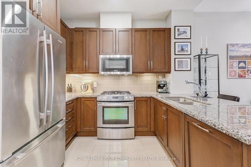 803 - 11 Bronte Road, Oakville, ON - Indoor Photo Showing Kitchen With Double Sink