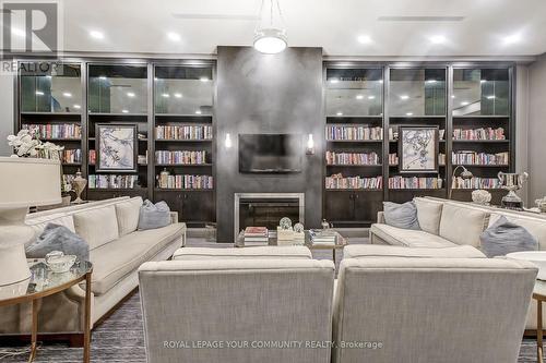 803 - 11 Bronte Road, Oakville, ON - Indoor Photo Showing Living Room With Fireplace