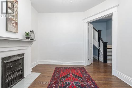 55 Lynd Avenue, Toronto, ON - Indoor Photo Showing Other Room With Fireplace