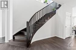 Stunning upgraded hardwood staircase. - 