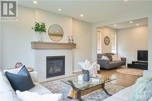 348 Gloaming Crescent, Ottawa, ON - Indoor Photo Showing Living Room With Fireplace