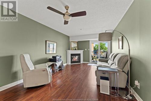 90 Murray Street Unit# 205, Amherstburg, ON - Indoor Photo Showing Living Room With Fireplace