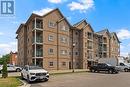 90 Murray Street Unit# 205, Amherstburg, ON  - Outdoor With Balcony With Facade 